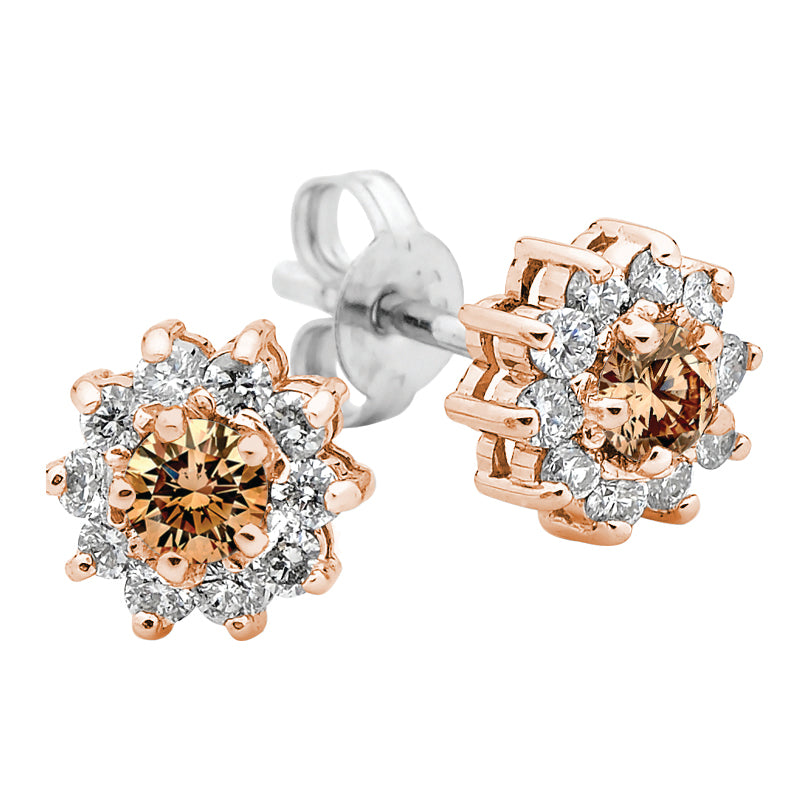 A pair of rose gold hoop earrings, with one earring featuring a larger chocolate diamond in the center surrounded by smaller white diamonds, and the other earring having a smaller, possibly white diamond in the center.