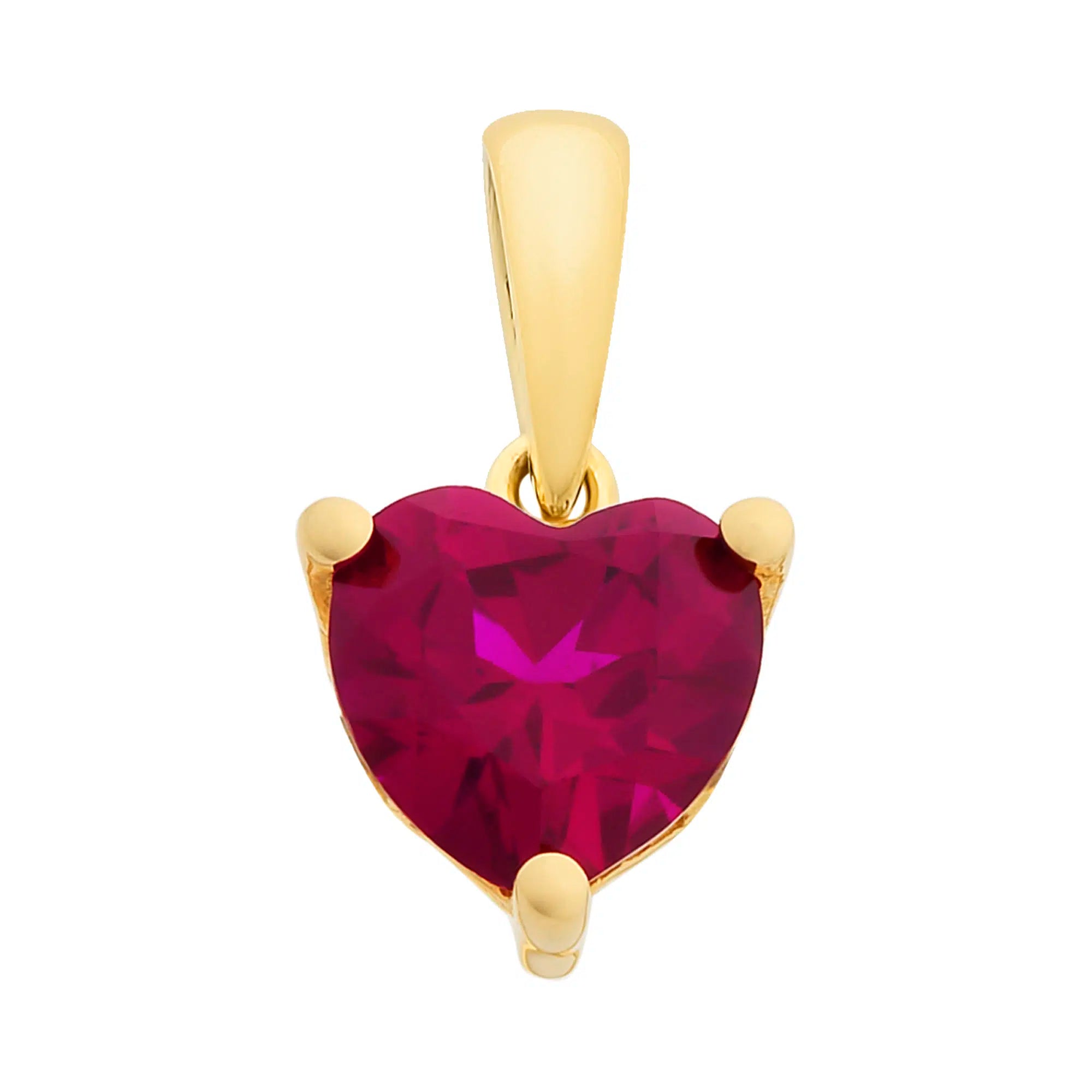 Gold pendant with a heart-shaped red gemstone on a white background