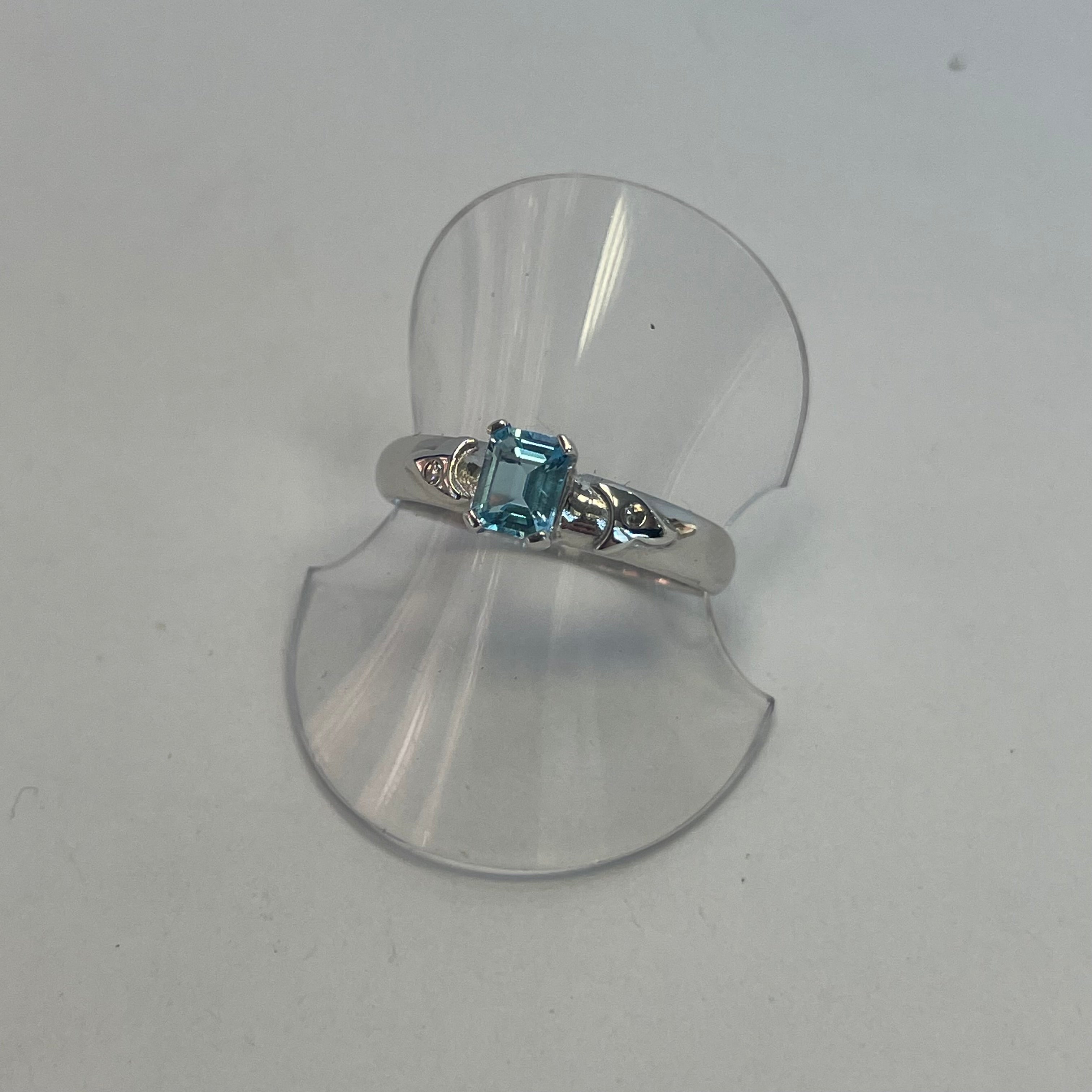 Celine 9ct White Gold Emerald Cut Blue Topaz Diamond Ring (Size M)