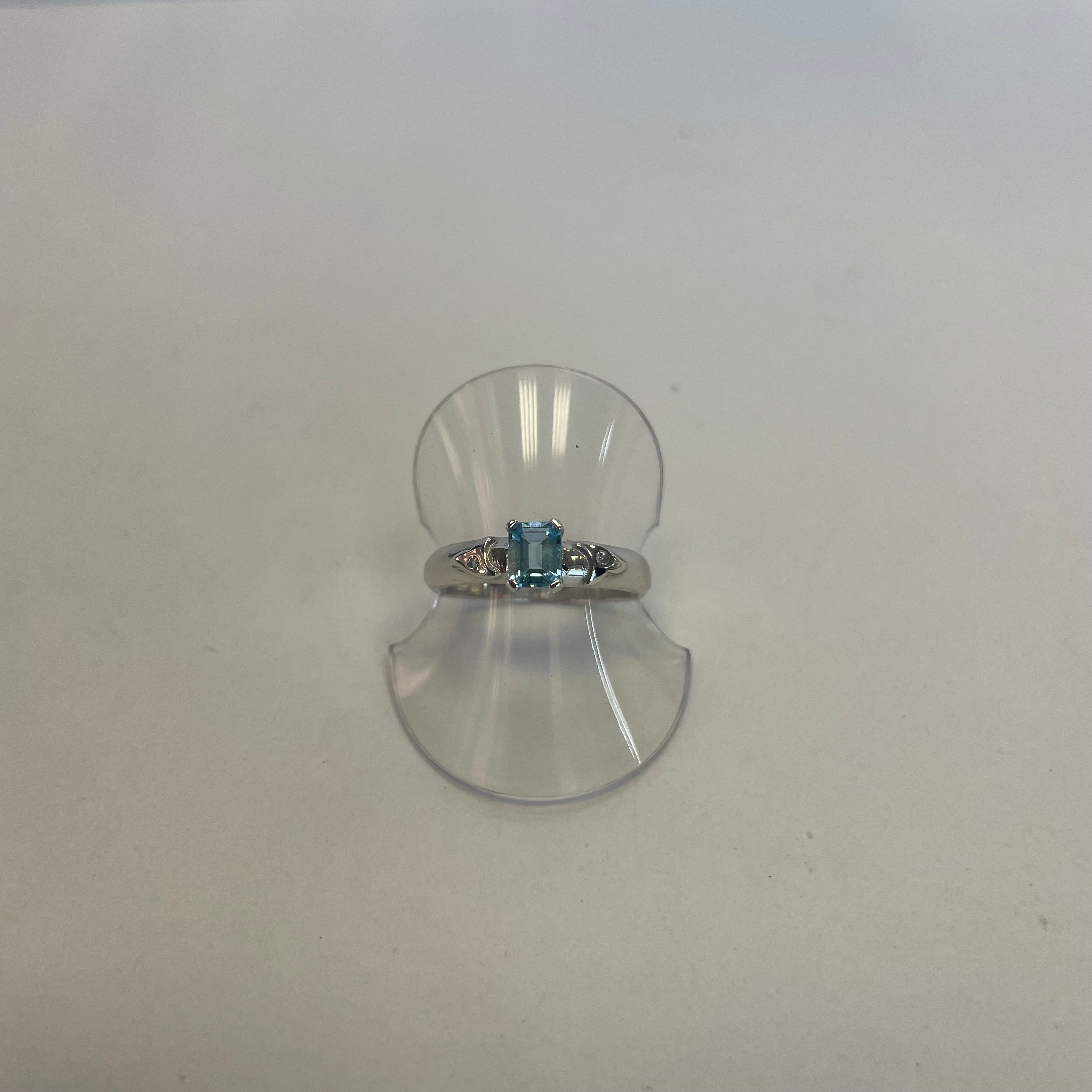 Celine 9ct White Gold Emerald Cut Blue Topaz Diamond Ring (Size M)