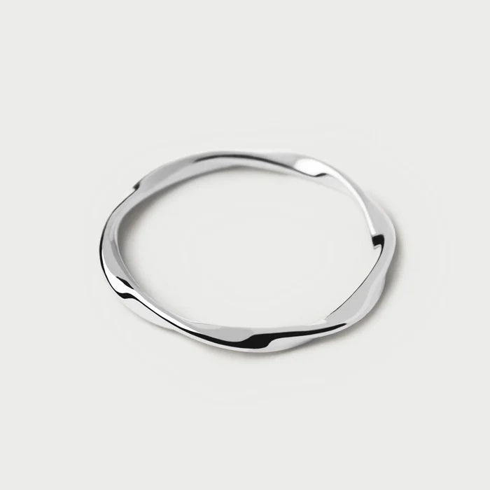 Silver ring on a light gray background