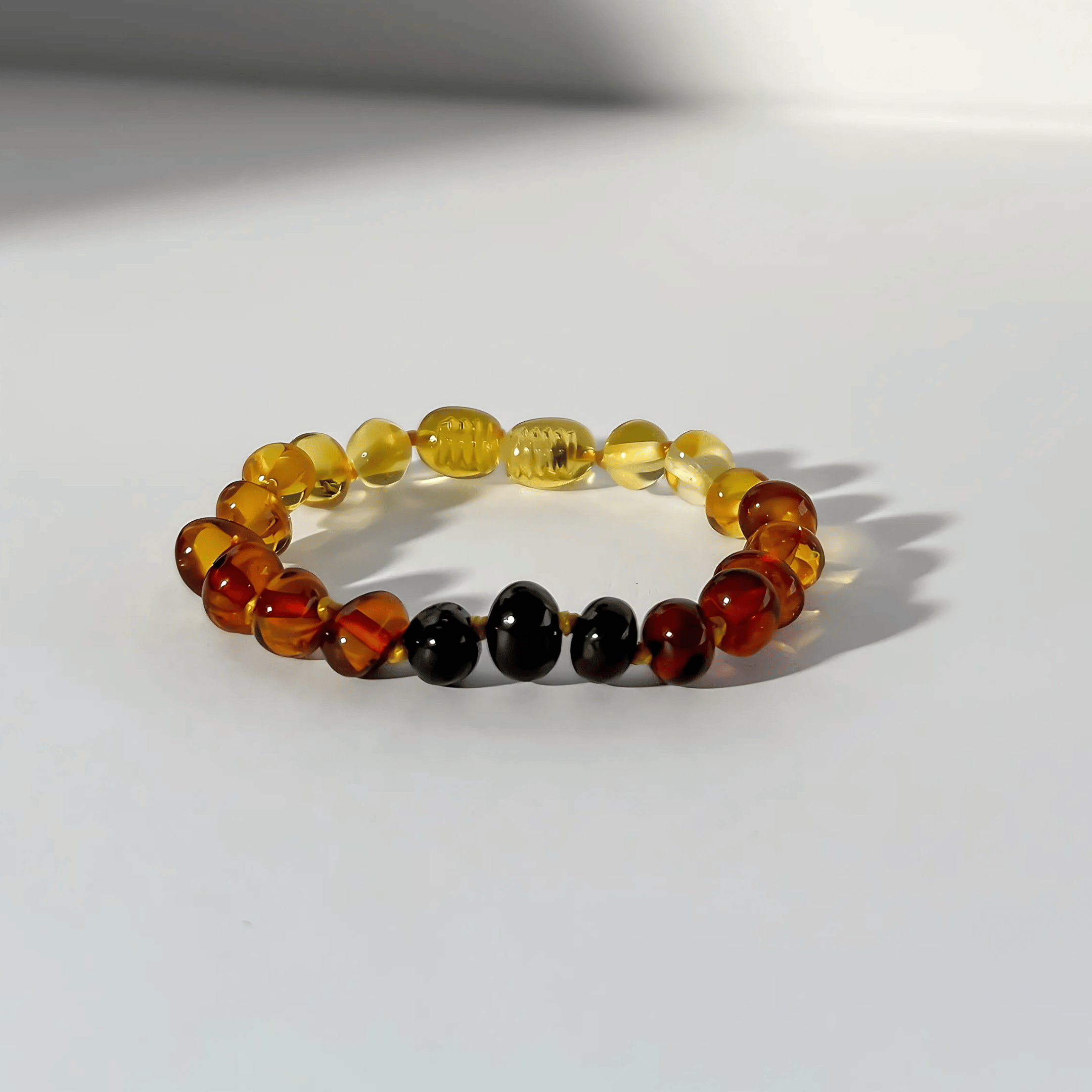 Multicolored beaded bracelet on a white background