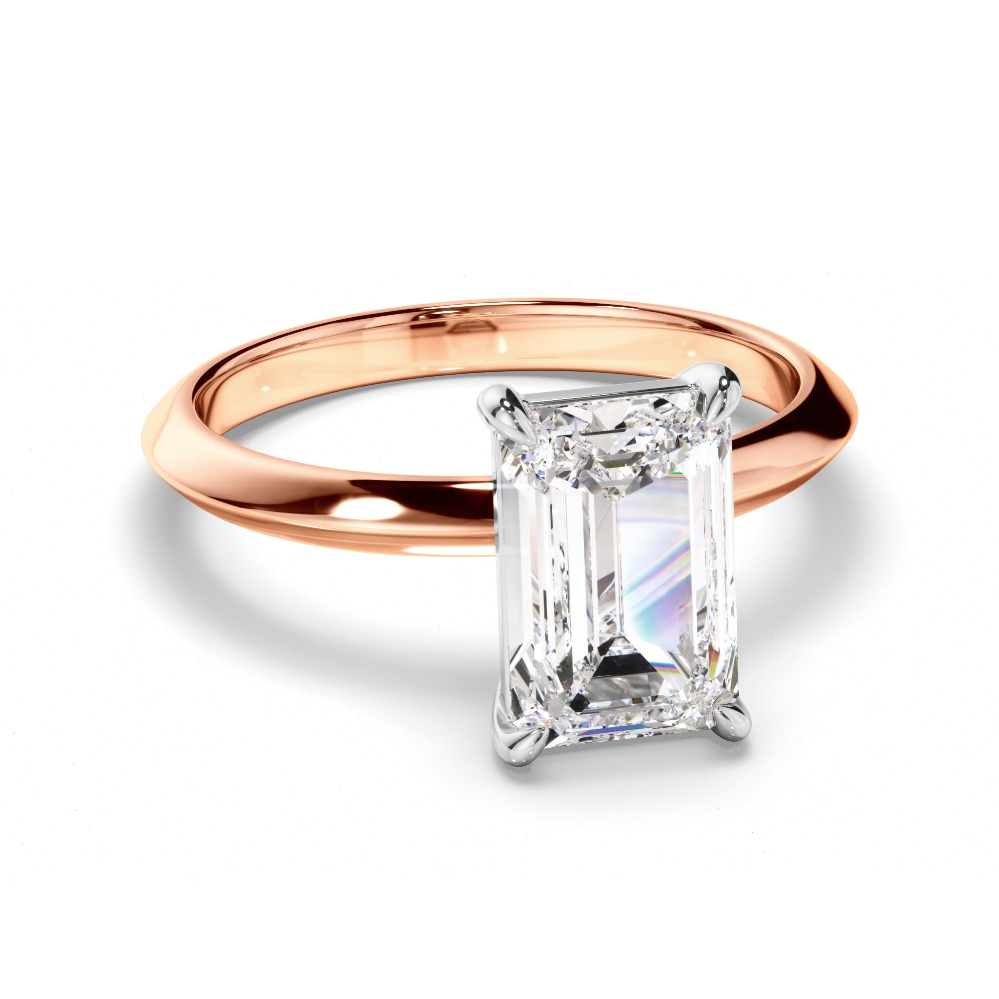 Rose gold ring with a rectangular diamond on a white background