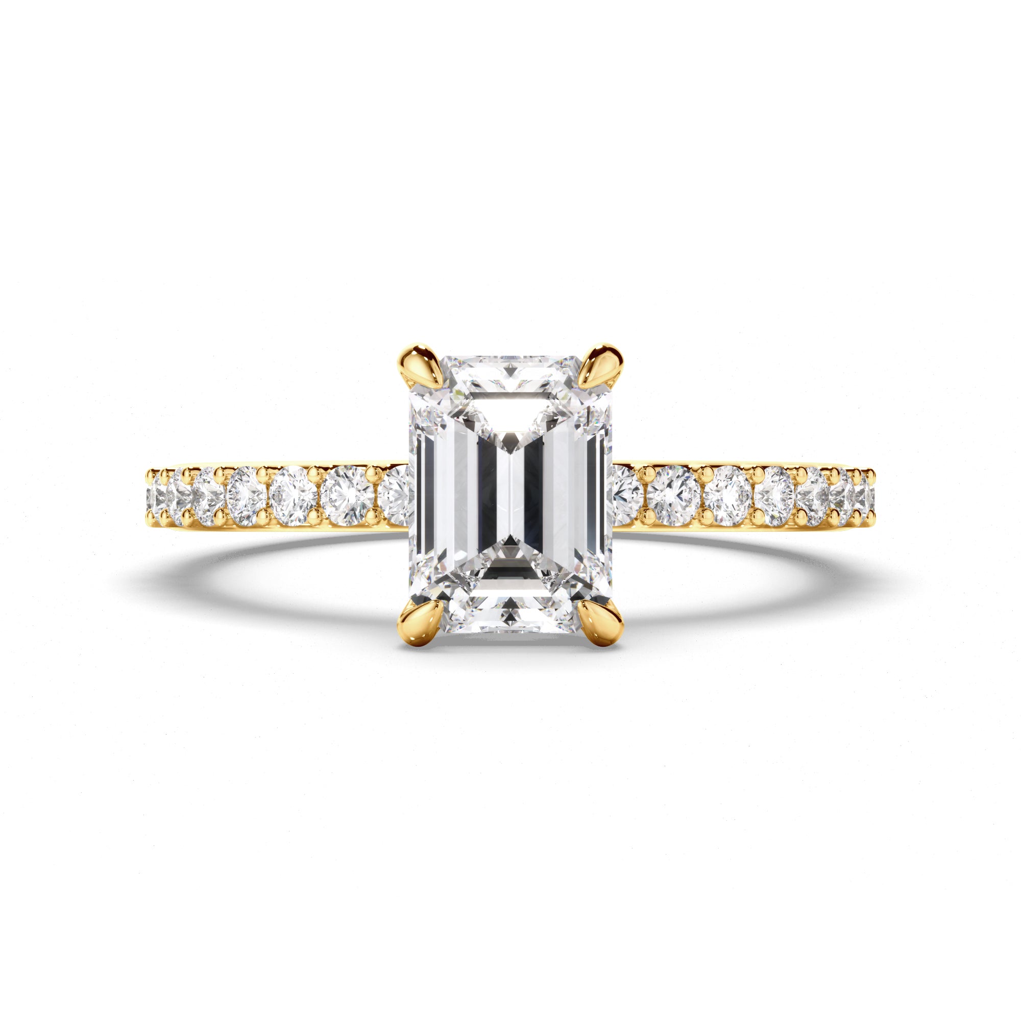 Yellow gold ring with emerald-cut diamond and smaller diamonds on a white background