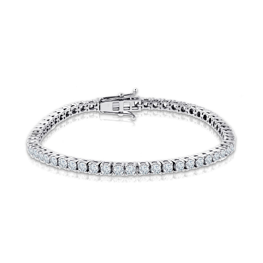 Silver bracelet with clear stones on a white background
