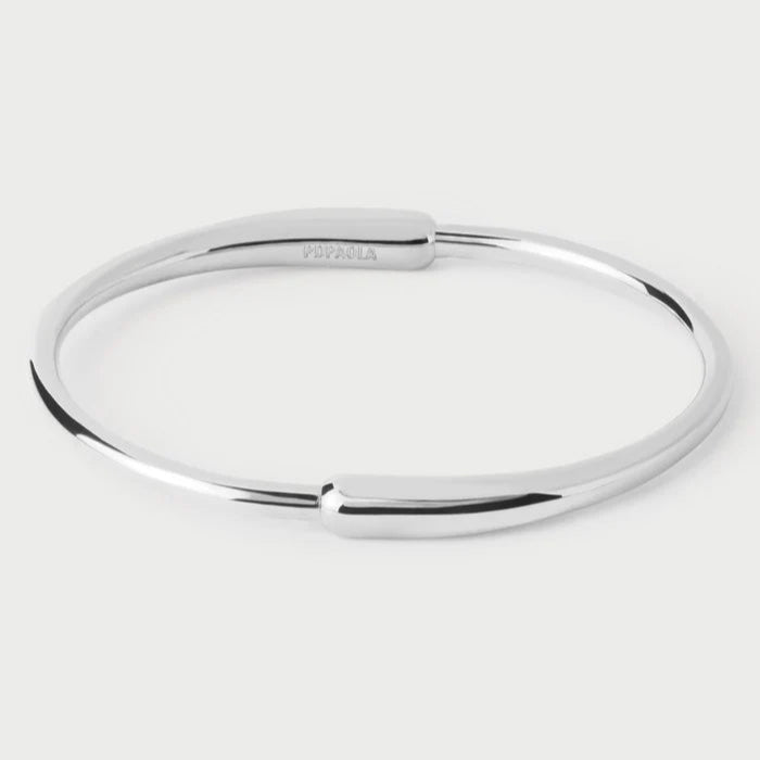 Silver bangle on a white background