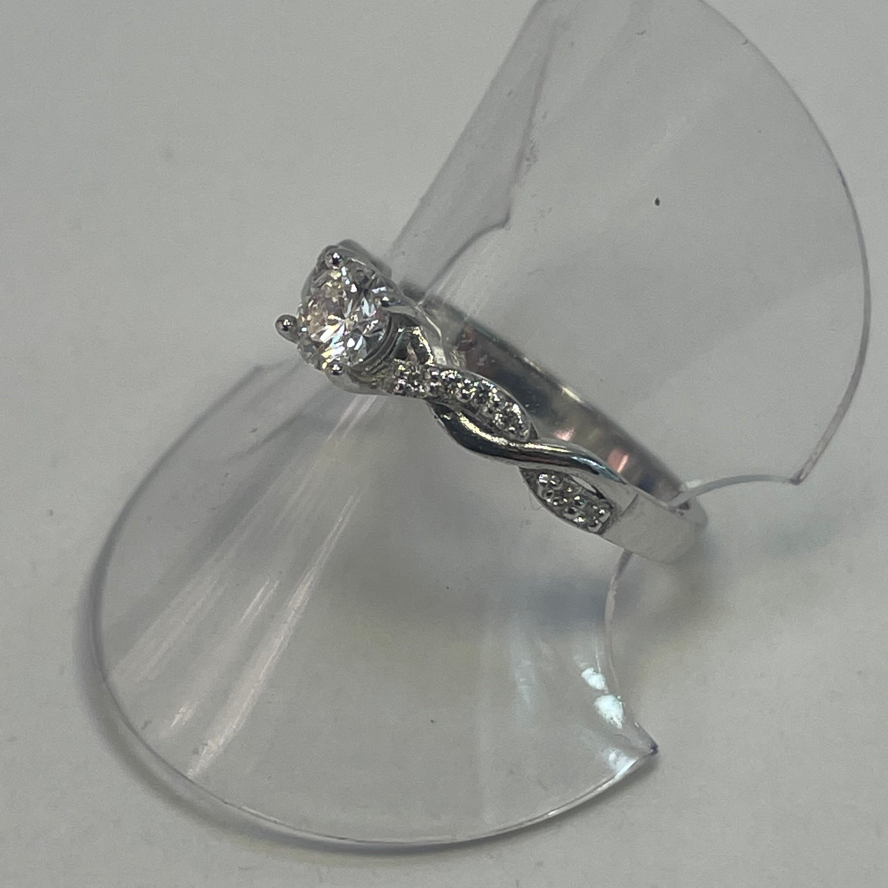 Ella Platinum Round Diamond Engagement Ring with Twist Diamond Shoulders (Size J 1/2)