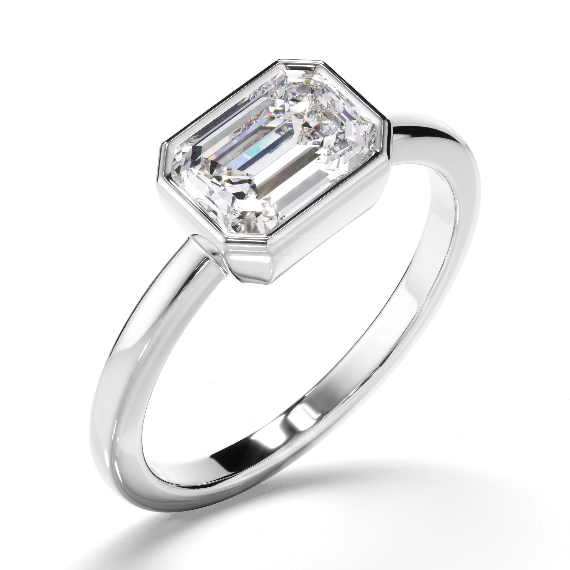 Venus - Emerald Cut Diamond Bezel East West Solitaire Engagement Ring