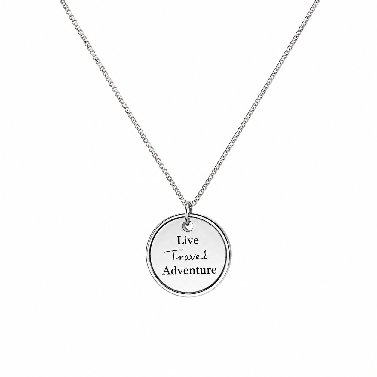 Silver necklace with a round pendant engraved with 'Live Travel Adventure' on a white background