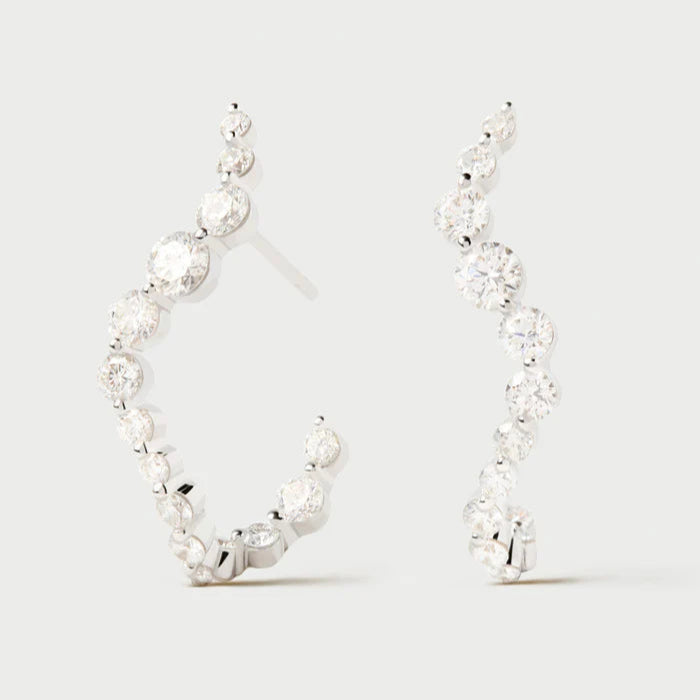 Pair of silver hoop earrings on a white background