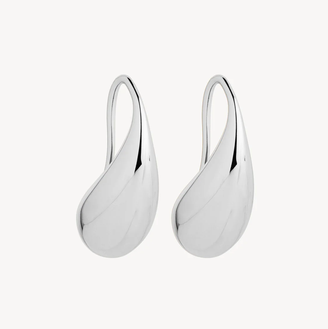 Pair of silver earrings on a white background