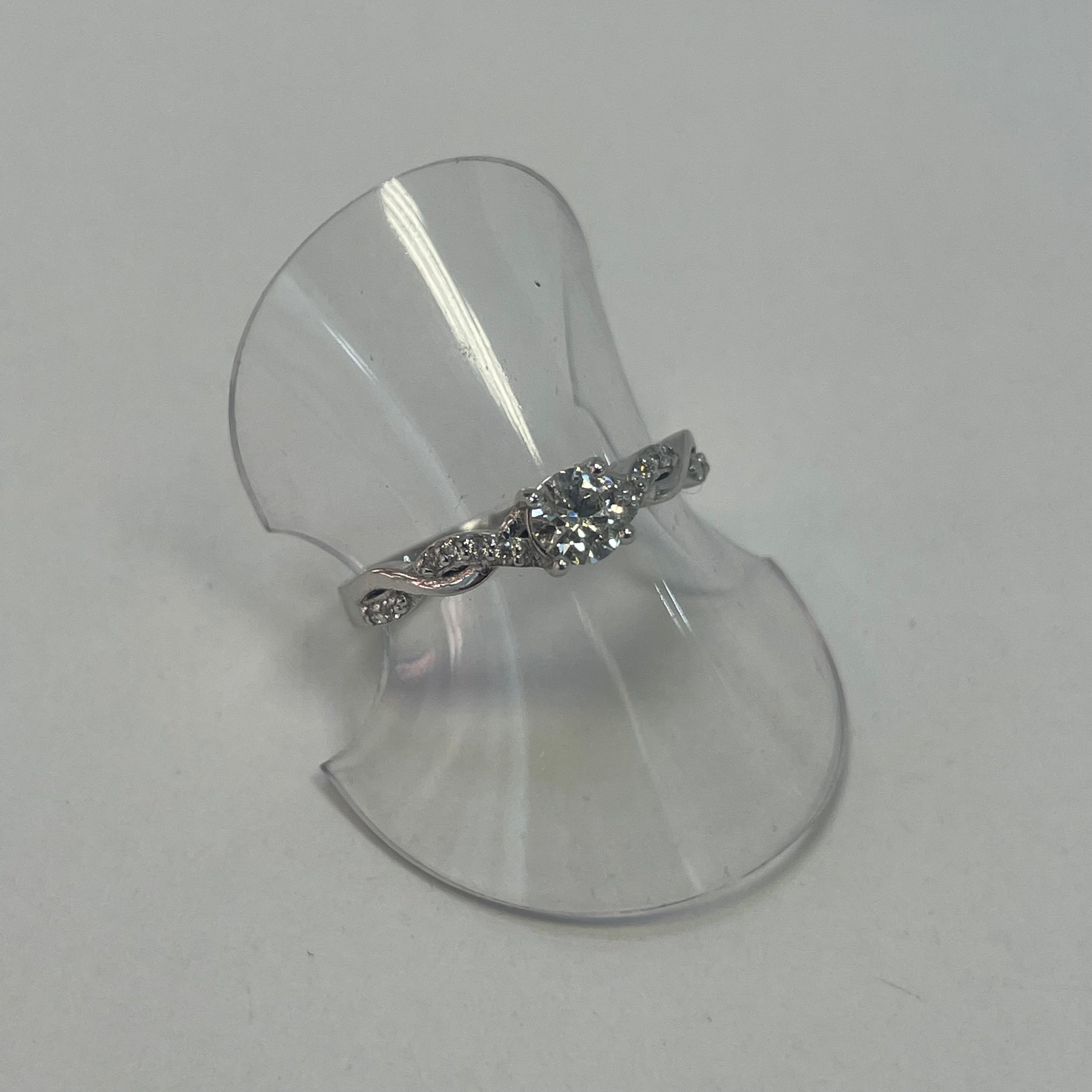 Ella Platinum Round Diamond Engagement Ring with Twist Diamond Shoulders (Size J 1/2)