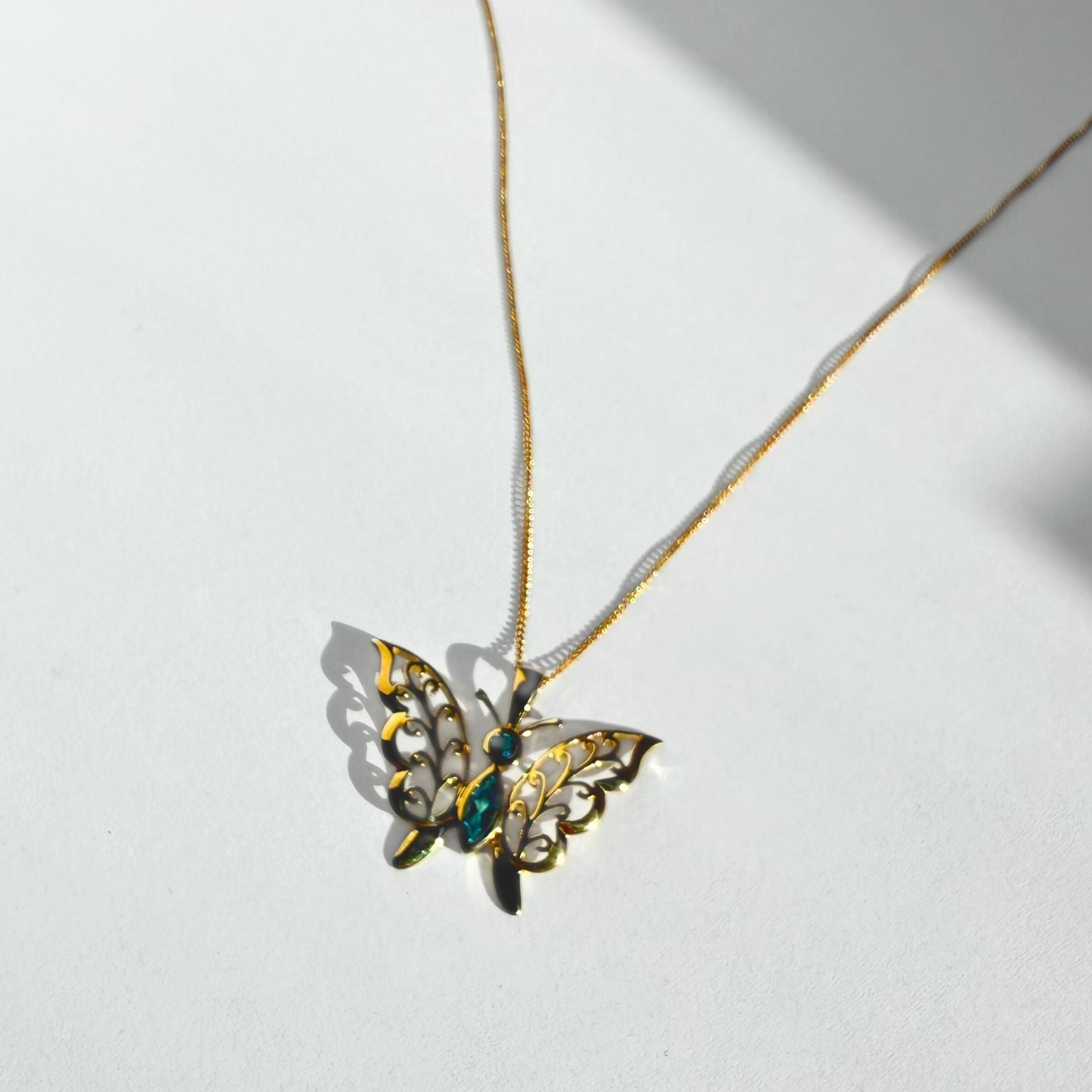 Blue Topaz Butterfly Pendant