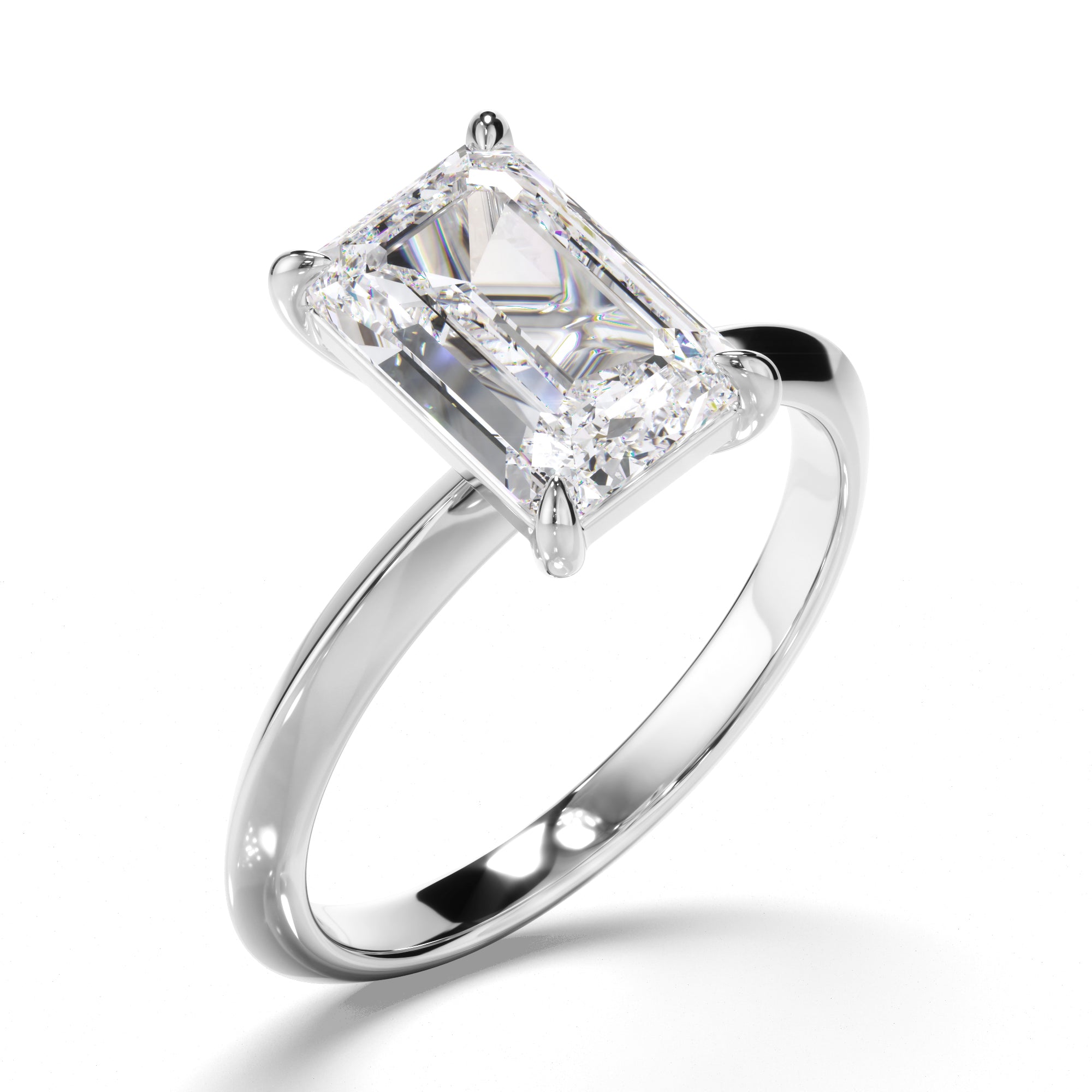 Diamond ring with a clear emerald diamond on a white background